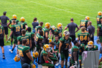 Die Cologne Crocodile Spieler beraten sich