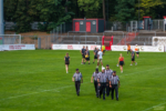 Die Schiedsrichter nach dem Spiel